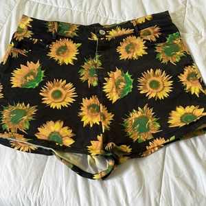 Motel Rocks sunflower shorts.